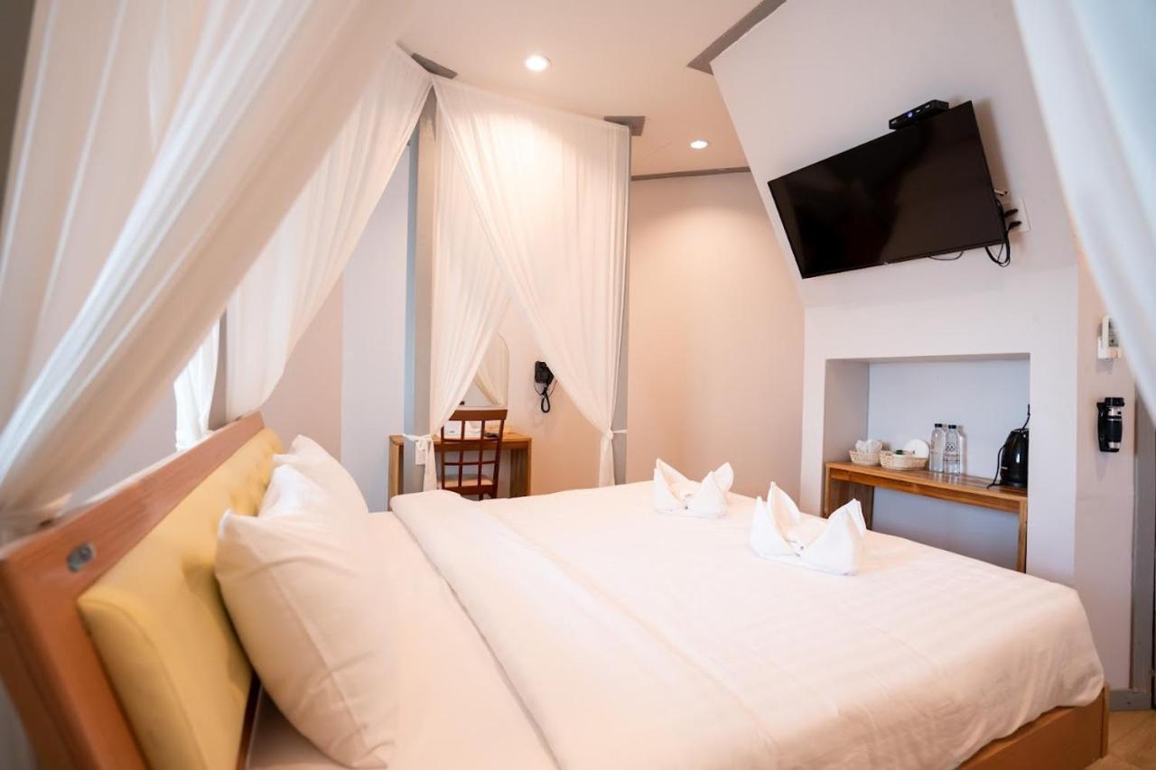 De Mala Hotel Sukhothai Bagian luar foto